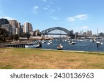 Panoramic view from North Sydney to Harbour bridge, CBD and boats.