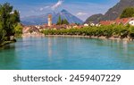 Panoramic view of Old City of Unterseen with Church and Aare river, Interlaken, Switzerland