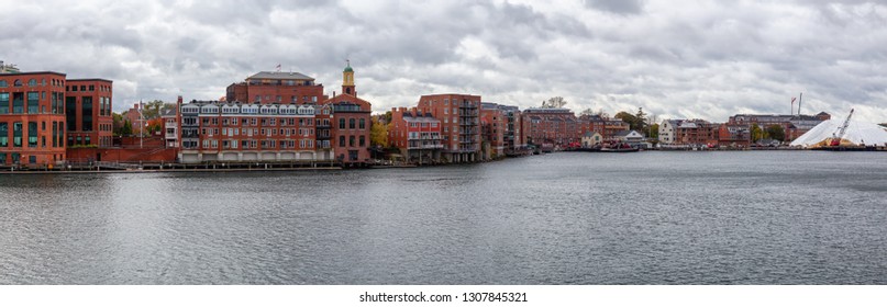 Panoramic view of an Old Historic Town during a cloudy morning. Taken in Portsmouth, New Hampshire, United States.