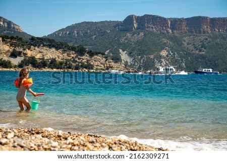 Panoramic view on cliffs, blue sea clear water on Plage du Bestouan beach in Cassis, Provence, France