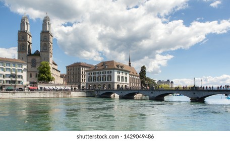 Panoramic View On Limmat River With Great Minster Church (Grossmünster), Wasserkirche And Münsterbrücke Of Zürich, Switzerland.