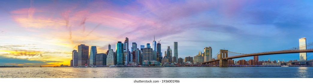 Panoramic view on Manhattan and Brooklyn bridge at sunset, New York City - Shutterstock ID 1936001986