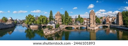 Panoramic view on The Ponts Couverts in Strasbourg with blue cloudy sky. France. 