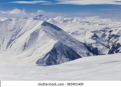 Panoramic View On Snowy Mountains