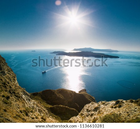  Panoramic view on Tholos Naftilos and Therasia near to Santorini island,   Greece.