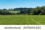 Panoramic view over the agriculture fields and meadows of the East-Belgian countryside near Burg-Reuland