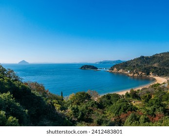 Panoramic view over the coastline with beach of Naoshima Island in the Seto Inland Sea in Japan, known for its museums of contemporary art, architecture and sculpture