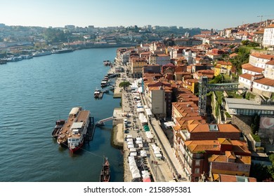 Panoramic View Over The Douro River From Deck On The Bridge Of - D. Luís I - To Gaia River Side With Cais De Gaia At The Background.  City Of Oporto In Portugal.