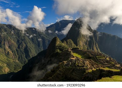 Panoramic View Over The Inca Old Temple City Of Machu Picchu Surrounded By A Group Of Clouds