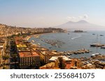 Panoramic view over Naples and harbour with Mount Vesuvius in Naples, Italy.