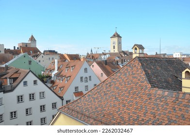 Panoramic view over red roofs of bavarian city Regensburg, Germany.Regensburg. View of the facades and tiled roofs of the old city.