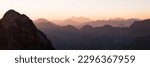 Panoramic view over the ridgeline near the summit of Nebelhorn at sunrise in the Allgäu alps - south Germany.