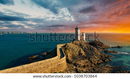 Panoramic view of Phare du Petit Minou in Plouzane with beautiful warm light at sunset. Brittany, France. 