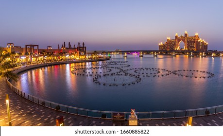 Panoramic View of The Pointe Palm Jumeirah and Atlantis Hotel during Blue Hour. Dubai - UAE. March 2020