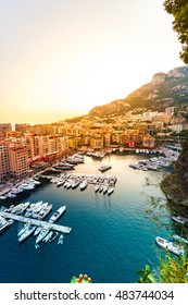 Panoramic View Of Port De Fontvieille In Monaco. Azur Coast. Colorful Bay With A Lot Of Luxury Yachts In Sunset.