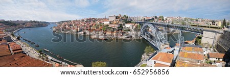 Similar – Blonde woman looks at bridge in Porto