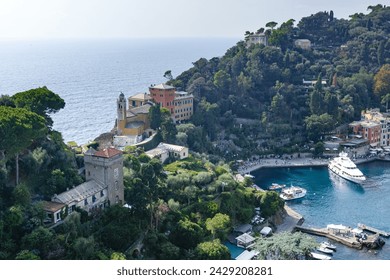 Panoramic view of Portofino, Italy. A picturesque fishing village with colorful hauses and a small harbor on Italian Riviera. - Powered by Shutterstock