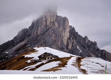 Panoramic view of Ra Gusela peak in front of mount Averau and Nuvolau, in Passo Giau, high alpine pass near Cortina d'Ampezzo, Dolomites, Italy