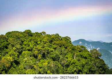 Panoramic view of rainbow over limestone karst mountains from Tiger Cave Temple, Krabi, Thailand