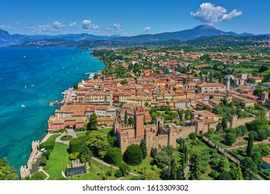 Panoramic view of the resort town of Lazise on Lake Garda, north of Italy. Aerial  - Shutterstock ID 1613309302