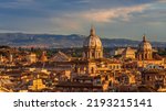 Panoramic view of Rome historical center old skyline at sunset with Church of St. Andrew of the Valley beautiful baroque dome