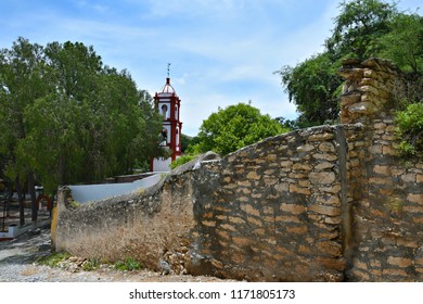 Panoramic View Of A  Rural Catholic Church Steeples With The Stone Walls Surroundings, In Armadillo De Los Infante, San Luis Potosí Mexico. 