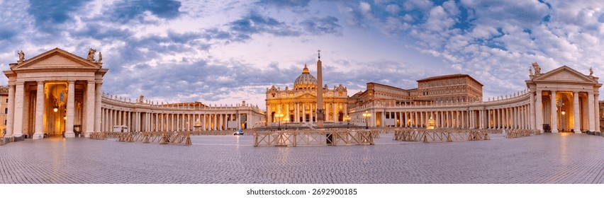 Panoramic view of Saint Peter Square and Saint Peter Basilica at dawn in Rome, Italy