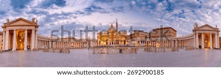 Panoramic view of Saint Peter Square and Saint Peter Basilica at dawn in Rome, Italy