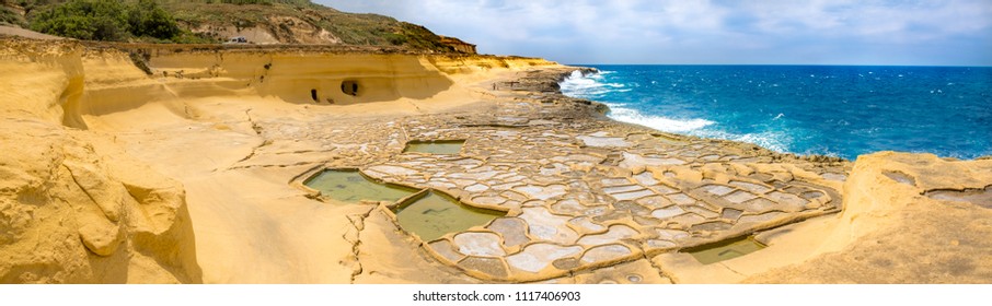 Panoramic view Salt evaporation ponds  also called salterns salt pans located near Qbajjar the maltese Island Gozo 