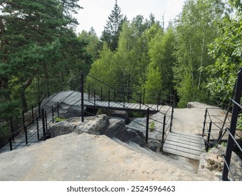 Panoramic view from sandstone rock viewpoint Ponorka, submarine at the top of 3 sandstone towers near Ceska Kamenice town. Summer landscape in Lusatian Mountains, green hills,oak and pine tree forest. - Powered by Shutterstock