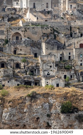Panoramic view of Sassi di Matera a historic district in the city of Matera, well-known for their ancient cave dwellings from the Belvedere di Murgia Timone,  Basilicata, Italy 