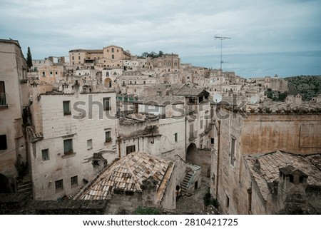 Panoramic view of the Sassi di Matera, a UNESCO World Heritage site, showcasing ancient stone houses and historical cave dwellings.