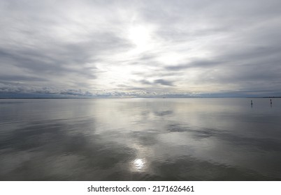 Panoramic view from the sea shore after the storm. Waves, splashes, water surface. Soft sunlight, dramatic sky. Idyllic seascape. Pure nature, environment, ecology, weather, cyclone