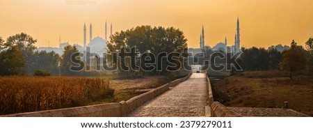 Panoramic view of Selimiye Mosque and Üç Şerefeli Mosque from Yalnızgoz Bridge in the early morning hours. October 22, 2023. Edirne, Turkey. Stock photo © 