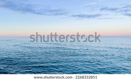 Panoramic view from the shore of the Mediterranean Sea at sunset. Nostalgic landscape, bright clouds, golden sunlight after the storm. nature environment climate change unstable weather wallpaper and 