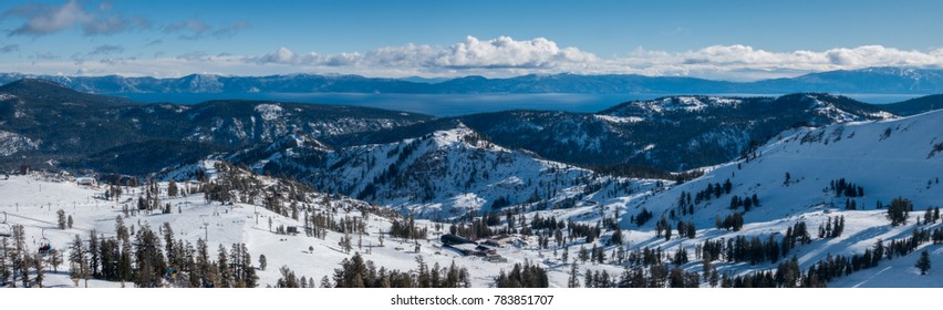 Panoramic View Of The Sierra Nevada Mountains, With Lake Tahoe In The Background, From The Top Of The Squaw Valley Ski Resort, Between Truckee And Tahoe City, On A Partly Cloudy Winter Day In December