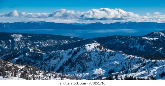 Panoramic View Of The Sierra Nevada Mountains, With Lake Tahoe In The Background, From The Top Of The Squaw Valley Ski Resort, Between Truckee And Tahoe City, On A Partly Cloudy Winter Day In December