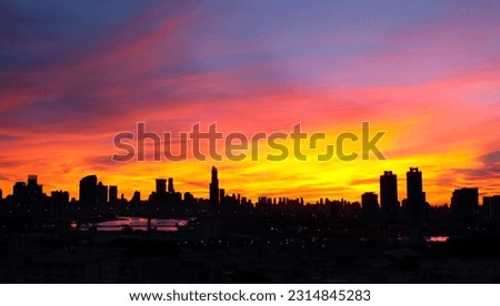 Panoramic view silhouette of the city skyline at sunset and dusk. View of the city's business district The world's most important financial center Asia 
