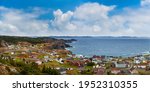 Panoramic view of a small town on the Atlantic Ocean Coast. Colorful Blue Sky Art Render. Taken in Crow Head, North Twillingate Island, Newfoundland and Labrador, Canada.