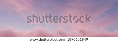panoramic view to soft purple sky with fluffy clouds and crescent moon