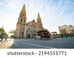 panoramic view of some beautiful carts on a quiet morning with the Guadalajara Cathedral in the background