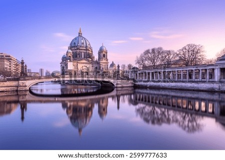 panoramic view at the spree river and the cathedral of berlin during sunset