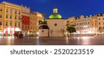 Panoramic view of St Adalberts Church on Main Market Square in Krakow, Poland, during the evening