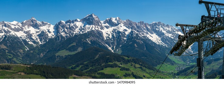 Panoramic view at the Steinberge behind Hintermoos and Maria Alm am Steinernen Meer from the top of a cableway