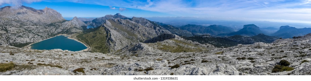 Panoramic view from the summit to the two mountain lakes and the mountain range.  
