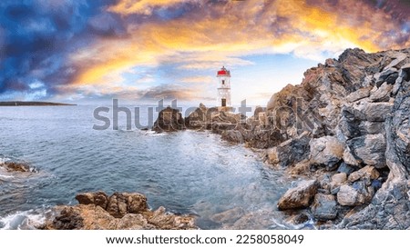 Panoramic view of sunrise over Capo Ferro Lighthouse. Popular travel destination of Mediterranean sea. Location: Porto Cervo, Province of Sassari, Sardinia, Italy, Europe