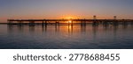 Panoramic view of a sunset at the Tinto dock, Huelva, Andalusia, Spain