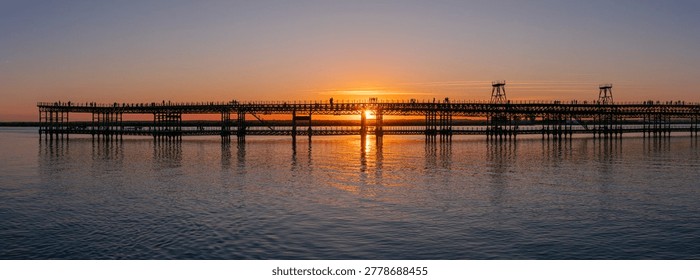 Panoramic view of a sunset at the Tinto dock, Huelva, Andalusia, Spain
