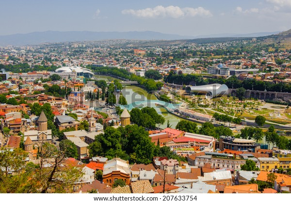 Panoramic\
view of Tbilisi, Georgia. Tbilisi is the capital and the largest\
city of Geogia with 1,5 mln people\
population