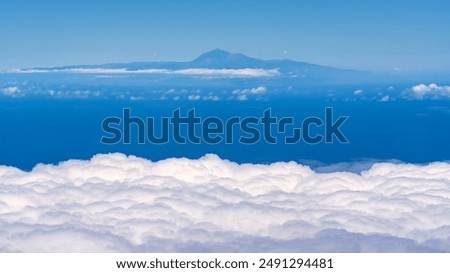 Panoramic view of the Teide volcano, the highest mountain in Spain, from a plane, Canary Islands.